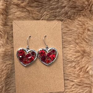 SOLD
Silver-tone metal heart-shaped dangle earrings